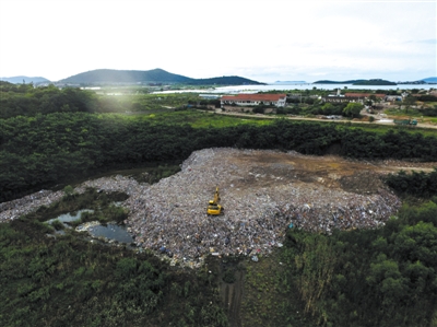 上海垃圾偷倒蘇州 運(yùn)一船垃圾2000元